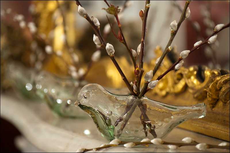A recycled glass chickadee vase invokes thoughts of peace this holiday season.